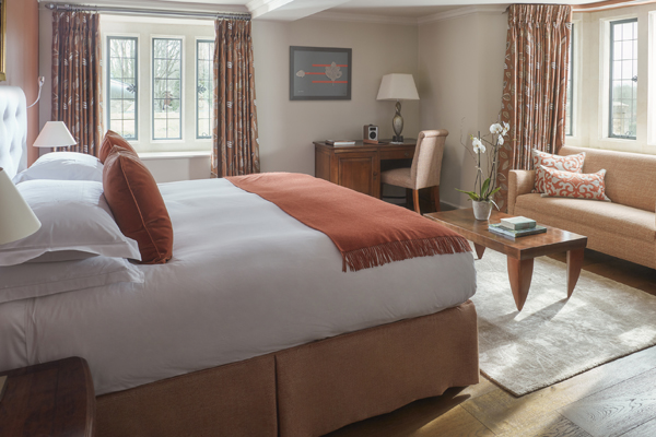 Spacious Superior Room at Whatley Manor featuring period character, armchairs, and luxury bathroom