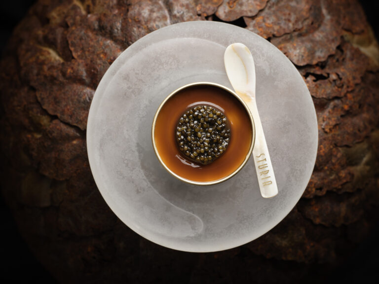 Artisanal caviar dish with garden herb infusions